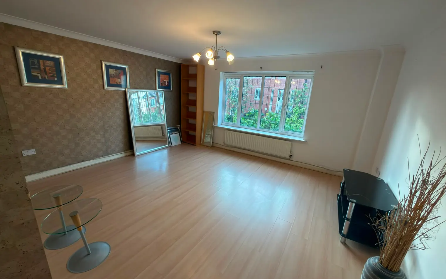 Living room after cleaning, with the floor clear